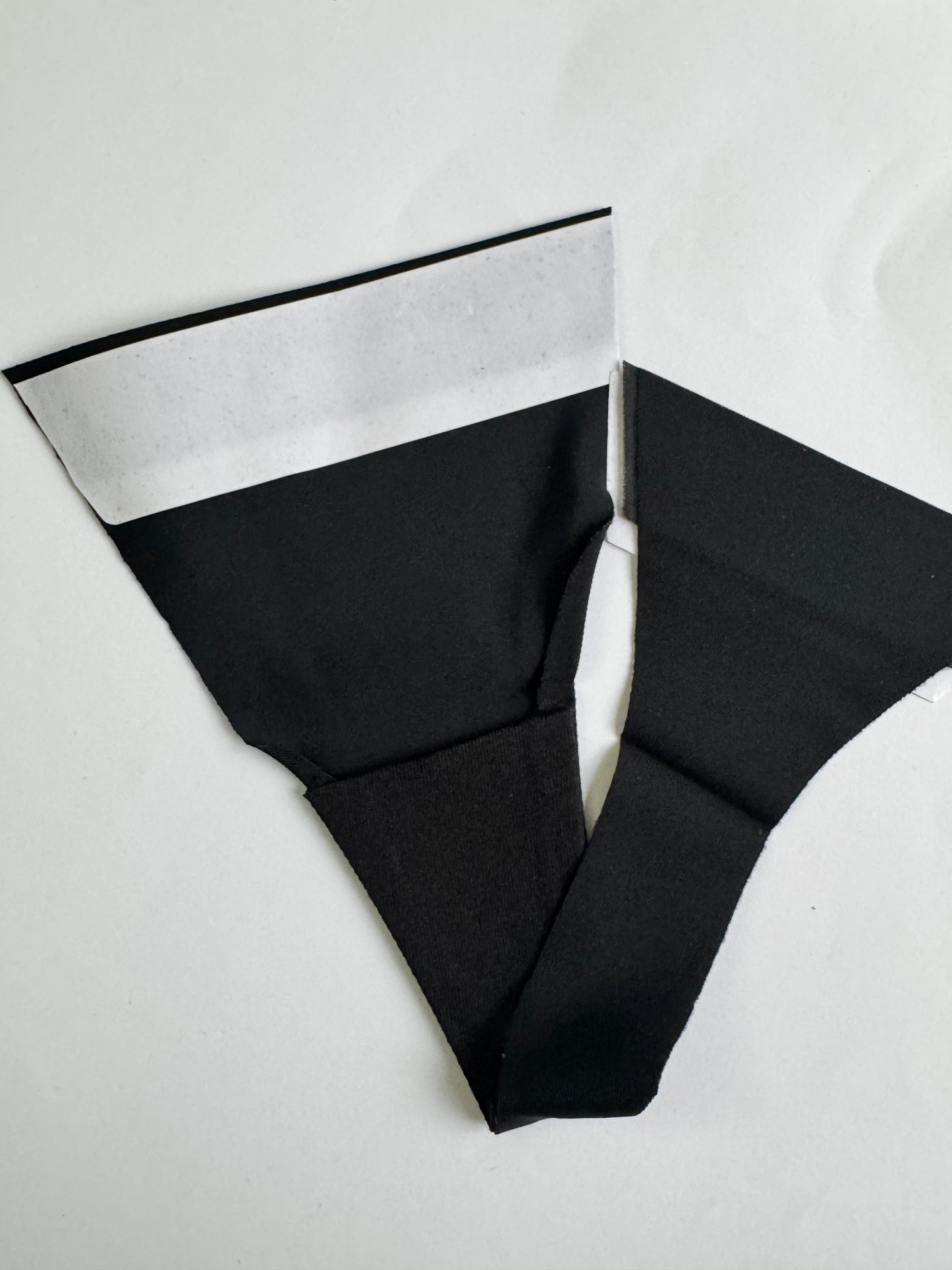 Adhesive strapless thong 